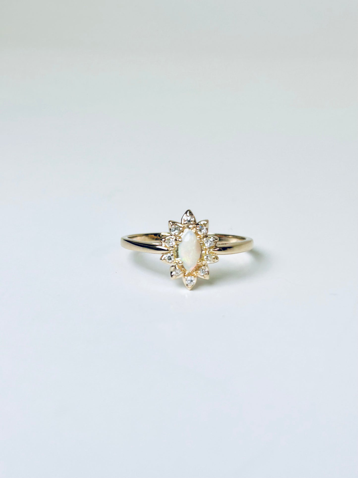 Opal and diamond marquise halo ring