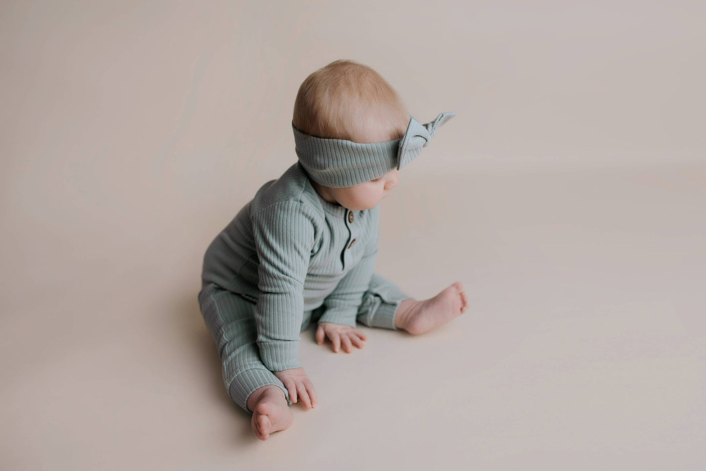 Baby Ribbed Playsuit with Pockets and Bow: Mauve / 6-12 Months