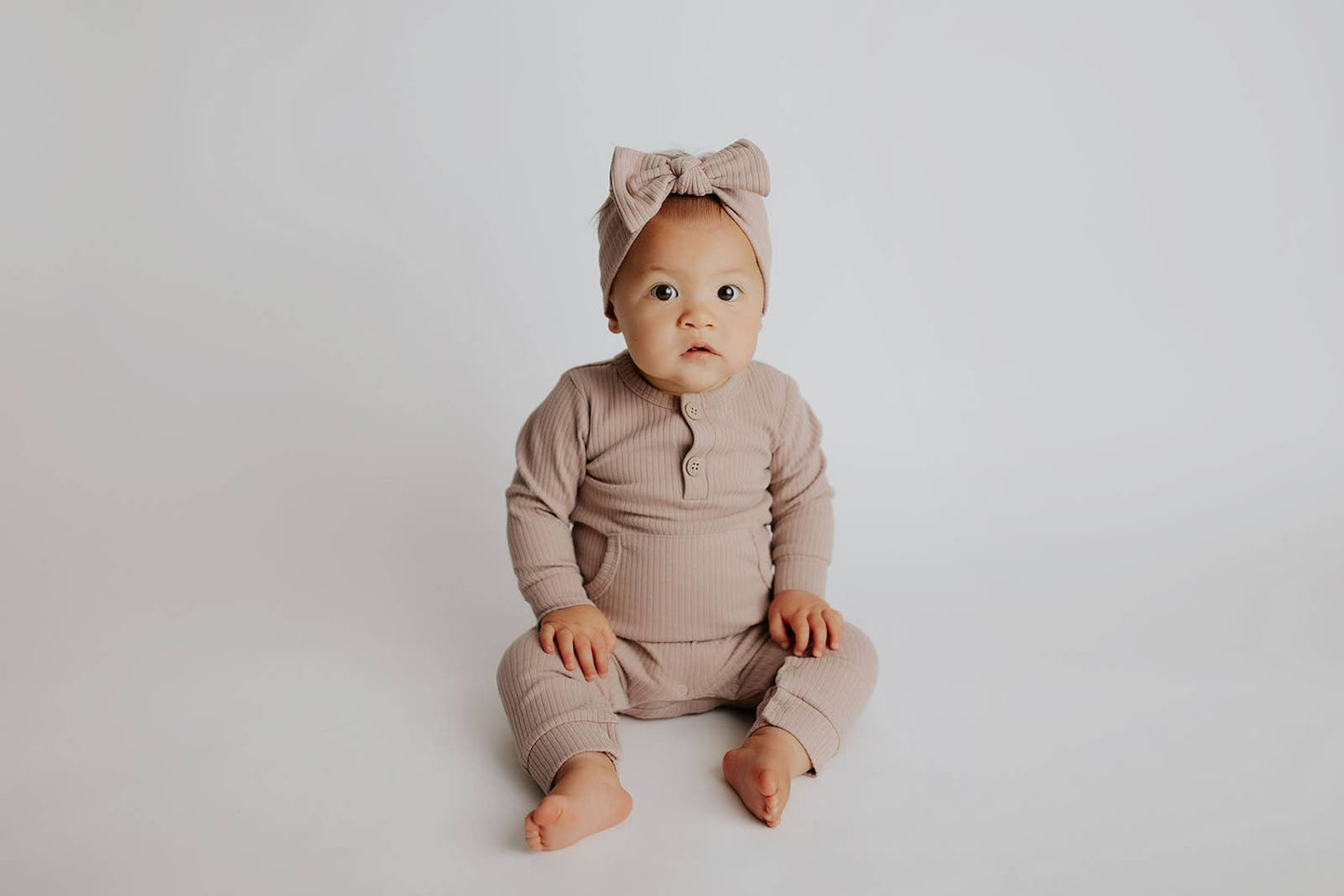 Baby Ribbed Playsuit with Pockets and Bow: Mauve / 6-12 Months